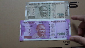 Indian notes New 500 and 2000 rupees compared with foreign notes