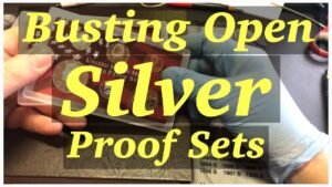 Silver proof sets being opened