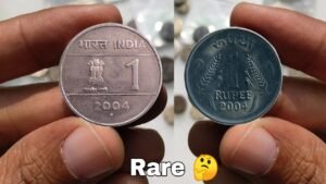 What is the value of one rupee coin?