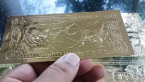 GOLD BANK NOTES FROM ANTIGUA AND BARBUDA