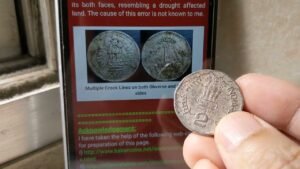 Cracked surface 2 ₹ error coin found in circulation